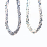 Silver oxidized hammer textured peanut shape hoop earrings with sterling silver hooks - Metal Studio Jewelry
