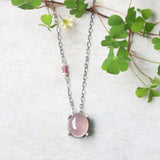 Oval cabochon rose quartz necklace in silver bezel and prongs setting with pink multi-sapphire beads secondary on oxidized silver chain - Metal Studio Jewelry