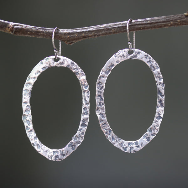 Silver oxidized hammer textured oval hoop earrings with sterling silver hooks - Metal Studio Jewelry