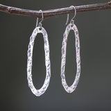 Silver oxidized hammer textured peanut shape hoop earrings with sterling silver hooks - Metal Studio Jewelry