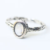 Sterling silver hard texture oxidized ring with tiny oval moonstone in silver bezel setting - Metal Studio Jewelry