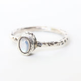 Dainty oval moonstone ring in silver bezel setting with oxidized texture sterling silver band - Metal Studio Jewelry