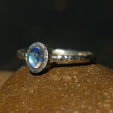 Oval cabochon moonstone ring in silver bezel setting with sterling silver oxidized hard texture band - Metal Studio Jewelry
