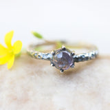 Round cabochon iolite ring in silver bezel and prongs setting with sterling silver oxidized hard texture band - Metal Studio Jewelry