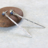 Sterling silver stud earrings with faceted blue sapphire in prongs setting and silver spike - Metal Studio Jewelry