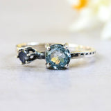 Round blue topaz ring in silver bezel and prongs setting with round moonstone - Metal Studio Jewelry