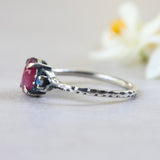 Oval ruby ring with tiny round faceted moonstone side set gems in prongs setting - Metal Studio Jewelry