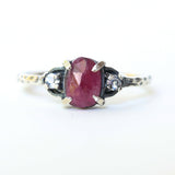 Oval ruby ring with tiny round faceted moonstone side set gems in prongs setting - Metal Studio Jewelry