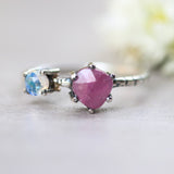 Faceted pink ruby ring in silver prongs setting and tiny moonstone - Metal Studio Jewelry