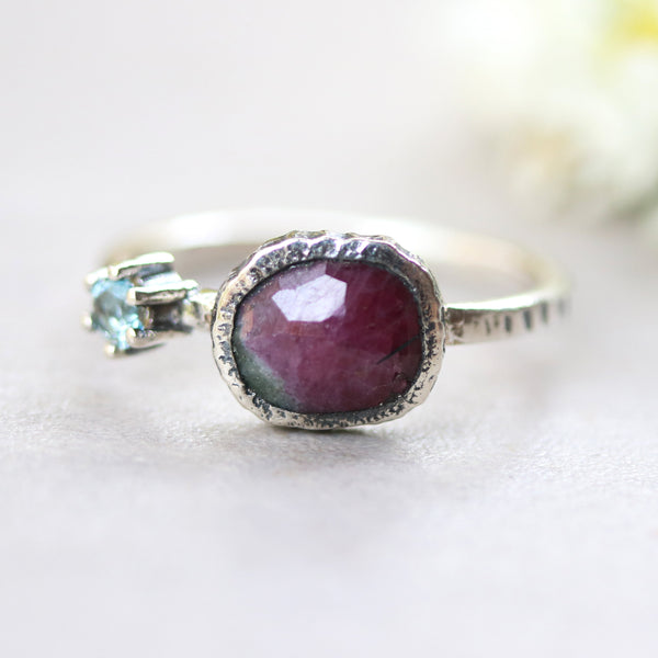Ruby zoisite ring in bezel setting with round blue topaz on  sterling silver oxidized texture band - Metal Studio Jewelry