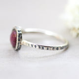 Ruby zoisite ring in bezel setting with round blue topaz on  sterling silver oxidized texture band - Metal Studio Jewelry