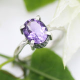 Oval faceted Amethyst ring in silver bezel and prongs setting in silver texture oxidized band - Metal Studio Jewelry