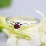 Dainty silver band with faceted round pink tourmaline gemstone in prongs setting - Metal Studio Jewelry