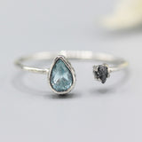 Blue topaz ring and rough diamond in silver bezel and prongs setting with sterling silver band