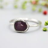 Red faceted ruby ring in silver bezel setting with sterling silver matte finish band - Metal Studio Jewelry