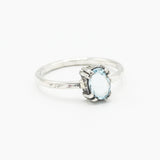 Oval Swiss blue topaz ring in silver bezel and prongs setting with sterling silver band - Metal Studio Jewelry