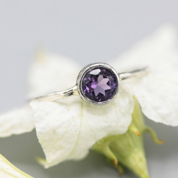 Round faceted amethyst ring in silver bezel setting with sterling silver band - Metal Studio Jewelry