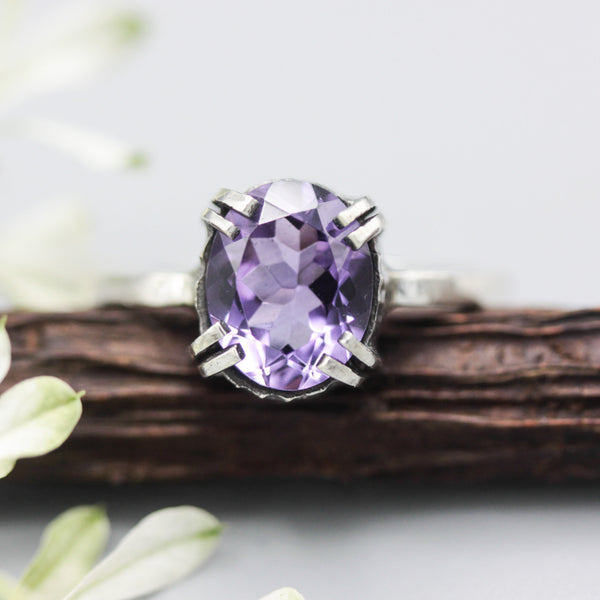 Faceted oval purple amethyst ring with sterling silver band - Metal Studio Jewelry