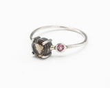 Faceted smokey quartz ring in silver prong setting with secondary garnet gemstone in 2mm silver round band - Metal Studio Jewelry