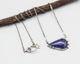 Teardrop faceted Lapis lazuli pendant necklace in silver bezel and brass prongs setting - Metal Studio Jewelry