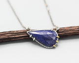 Teardrop faceted Lapis lazuli pendant necklace in silver bezel and brass prongs setting - Metal Studio Jewelry