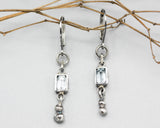 Earrings Princess cut Swiss blue topaz in silver bezel setting with silver peanut on sterling silver hooks style - Metal Studio Jewelry
