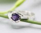 Bypass style ring sterling silver hammer texture with round faceted Amethyst at the center
