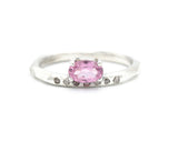 Oval faceted pink tourmaline ring in prongs setting with tiny champagne diamonds on sterling silver geometric texture design band