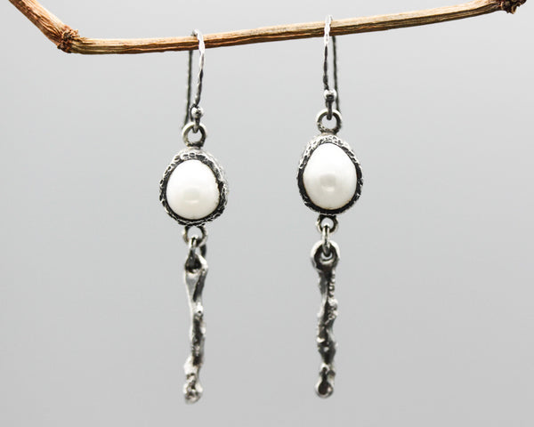 Teardrop white Freshwater Pearls earrings in bezel setting with silver stick on oxidized sterling silver hooks style