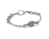 Oval cabochon natural ruby bracelet in silver bezel setting and sterling silver oxidized chain