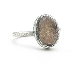 Brown oval druzy quartz ring in silver bezel setting with sterling silver texture band