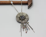Flower pendant necklace with black Brazilian druzy in silver bezel and brass prongs setting