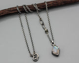 Rhombus shape faceted Moonstone pendant necklace in silver bezel setting