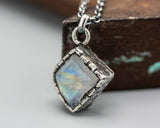 Rainbow faceted Moonstone pendant necklace in silver bezel setting