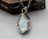 Marquise shape faceted Moonstone pendant necklace in silver bezel setting