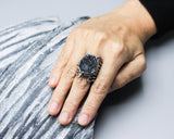 Black teardrop Brazilian druzy ring in silver bezel and prongs setting with sterling silver skeleton band