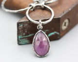Teardrop pink sapphire pendant necklace with silver circle loop and moonstone secondary