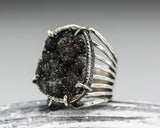 Black druzy ring in silver bezel and prongs setting with sterling silver skeleton multi wrap band