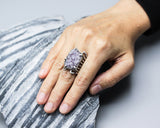 Raw purple Brazilian druzy ring in silver bezel and prongs setting with sterling silver skeleton band