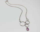 Teardrop pink sapphire pendant necklace with silver circle loop and moonstone secondary