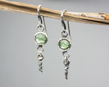 Round mint kyanite earrings in silver bezel setting with silver sticks and hooks style on the top