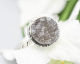 Round druzy quartz ring in silver bezel setting with sterling silver twist design band