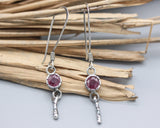 Round faceted Ruby earrings in silver bezel setting with silver sticks and hooks style on the top
