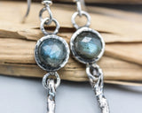Round faceted Labradorite earrings in silver bezel setting with silver sticks and hooks style on the top