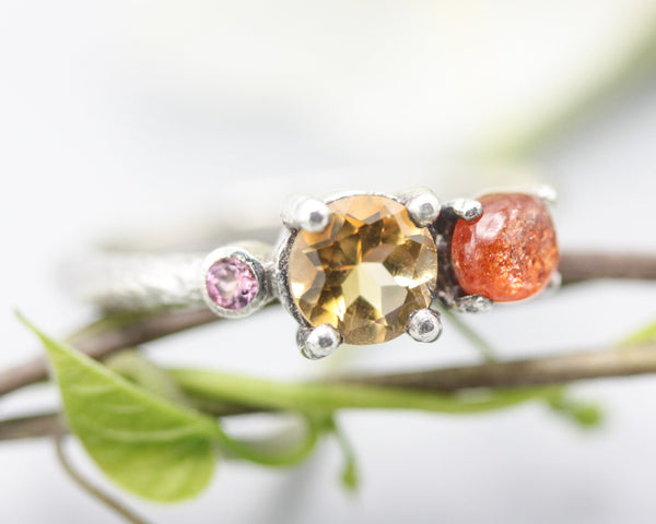 Sterling silver wedding ring with citrine, sunstone and pink tourmaline gemstone in bezel and prongs setting