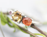 Sterling silver wedding ring with citrine, sunstone and pink tourmaline gemstone in bezel and prongs setting