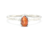 Teardrop cabochon Sunstone ring in prongs setting with sterling silver oxidized texture band