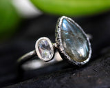 Teardrop Labradorite ring with tiny oval moonstone in silver bezel setting with sterling silver band