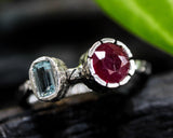 Round red ruby ring in silver bezel setting with blue topaz  sterling silver oxidized twist design band