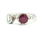 Red ruby ring with amethyst side set in silver bezel setting